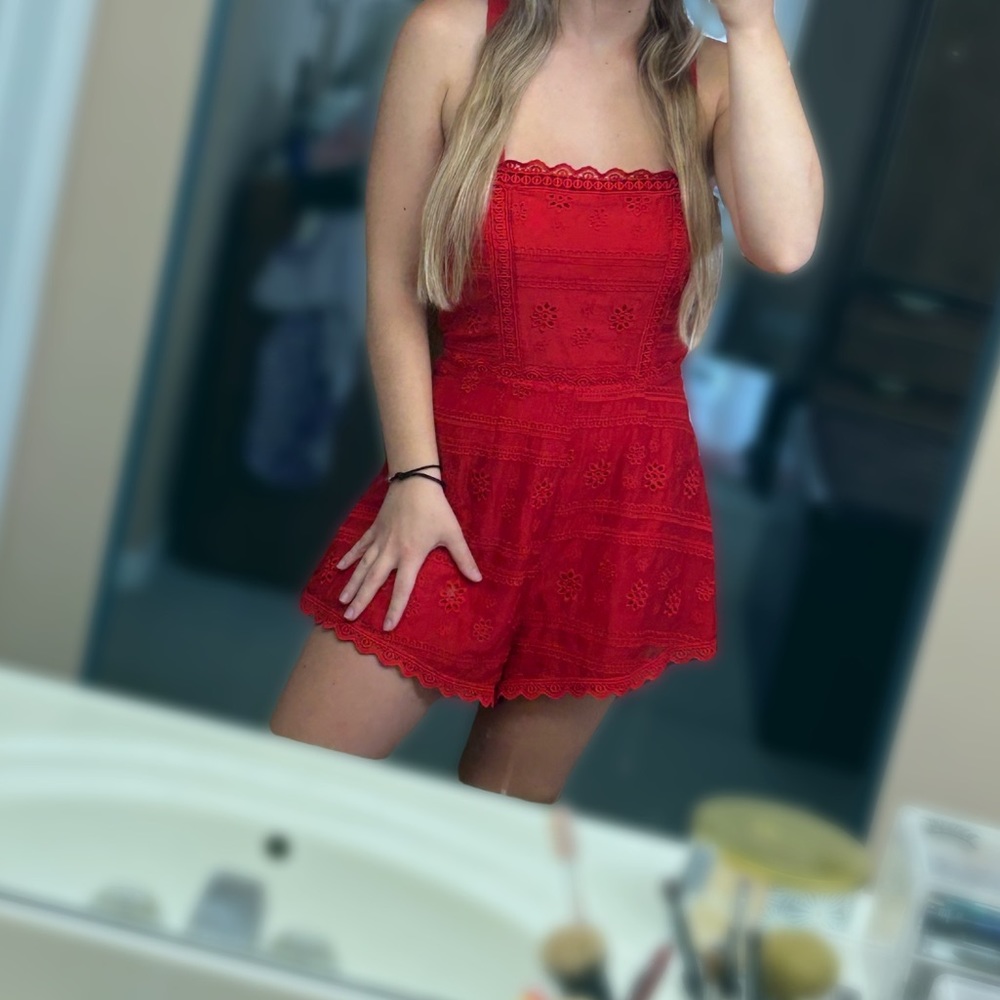 Gently used Red Lace Romper. Size S.